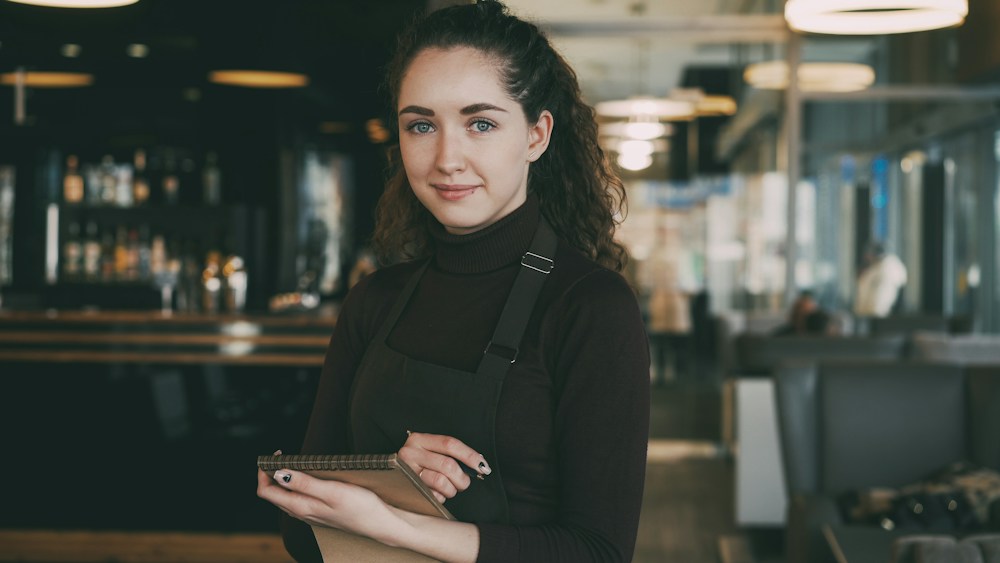 An employee in a restaurant.